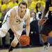 Michigan freshman Nik Stauskas moves the ball low in the second half against Iowa at Crisler Center on Sunday, Jan. 6. Michigan beat Iowa 95-67 in the Big Ten home opener. Melanie Maxwell I AnnArbor.com